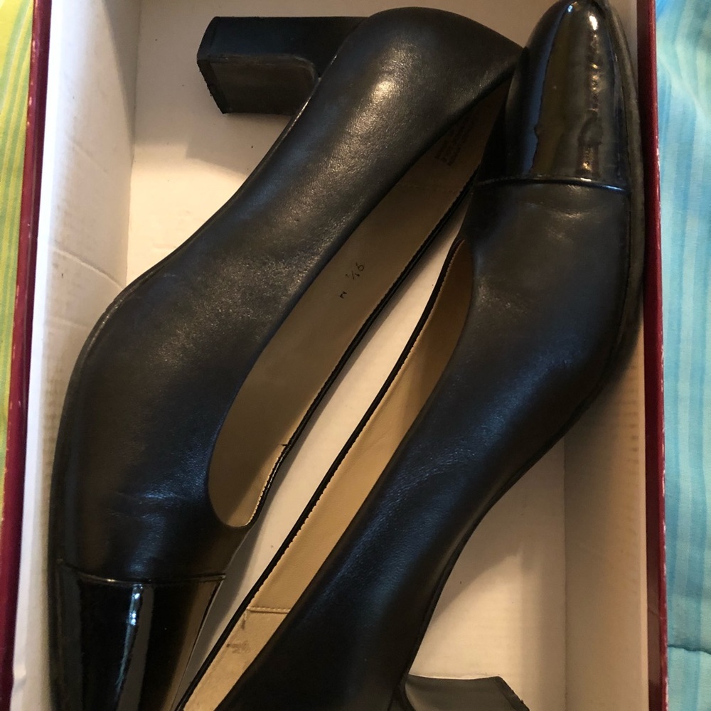 Etienne Aigner Patent leather toe and 2”heel.
